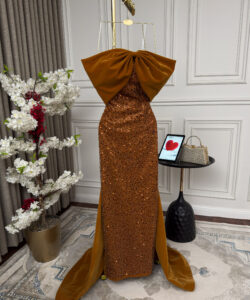 أجمل فساتين سهرة شموه بذيل طويل